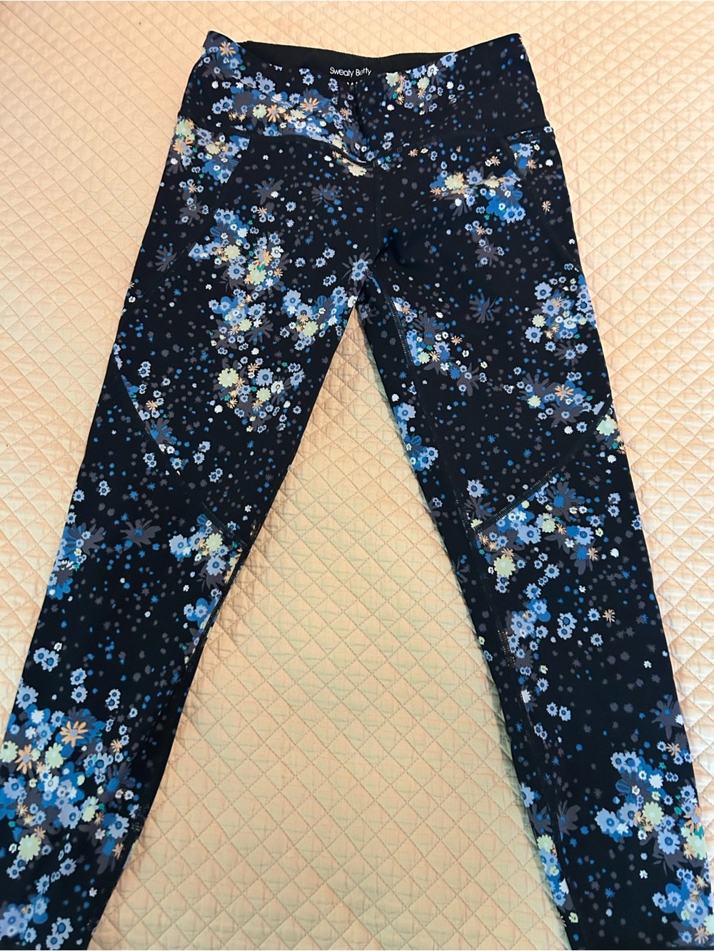 Sweaty Betty Black Floral Print Girls' Leggings with Blue Accents